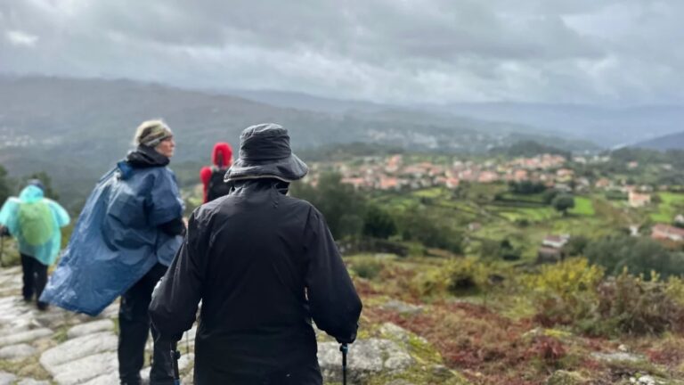 Hikers enjoying the mountain view above Soajo