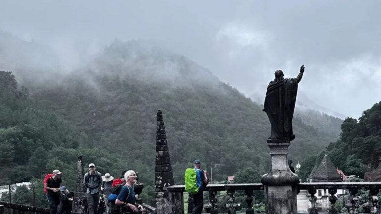 Statues of the Peneda Sanctuary in the mountain mist