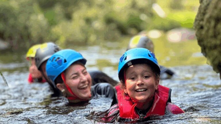 Swimming in a natural pool during river trekking in Gerês